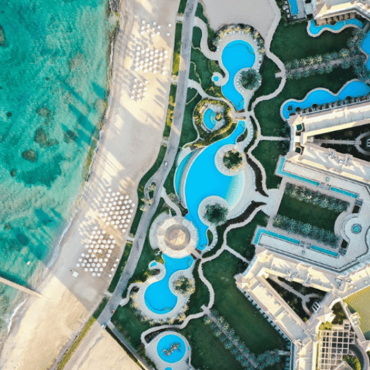 Hurghada travel guide featured image showing Red Sea coast resorts and turquoise water in Egypt