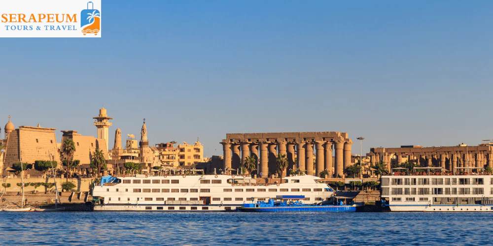 Luxor Travel Guide: Temples, Tombs & Tips for First-Time Visitors Panoramic view of Luxor with Nile River at sunrise Egypt