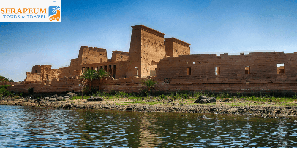 Aswan Travel Guide: Best Things to Do, Nile Cruises & Local Tips Boat crossing the Nile to Philae Temple