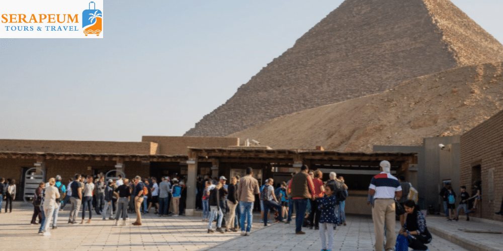 Visitors entering the Giza Pyramids archaeological site in Egypt