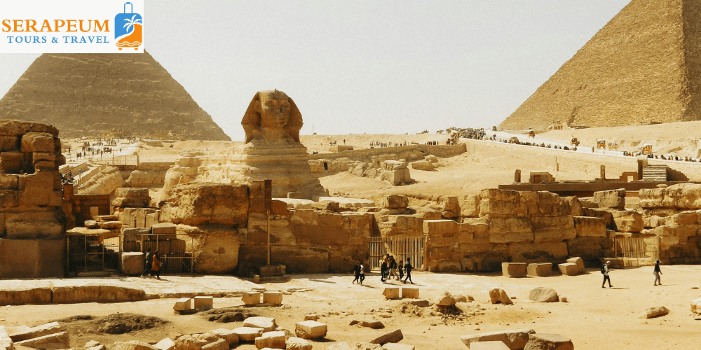 Travelers exploring the Giza Pyramids in Egypt